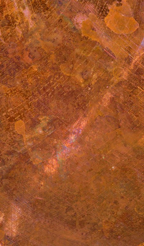 Panoramic grunge copper pan texture, patina and oxidized metal background. Old metal panel.